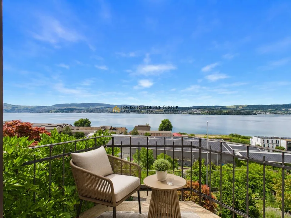Casa unifamiliare affascinante con terrazze giardino e vista mozzafiato sul lago
