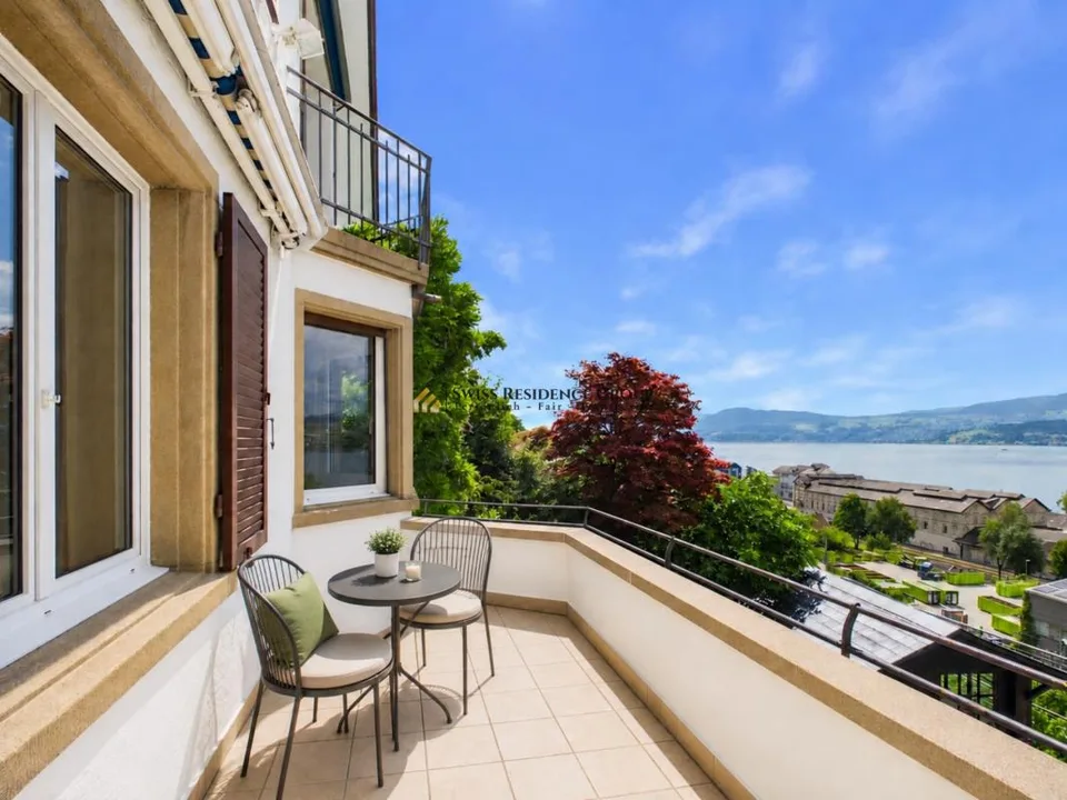 Casa unifamiliare affascinante con terrazze giardino e vista mozzafiato sul lago