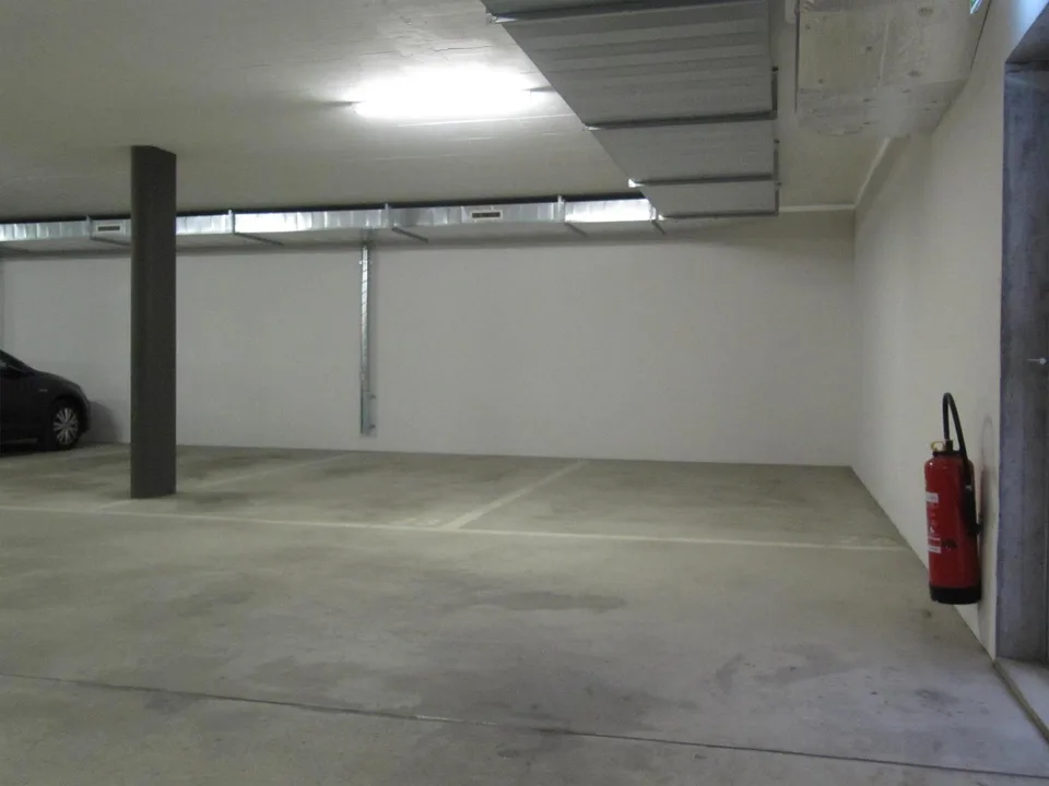 Tiefgaragenplatz zu vermieten - Perfekt erschlossene Lage