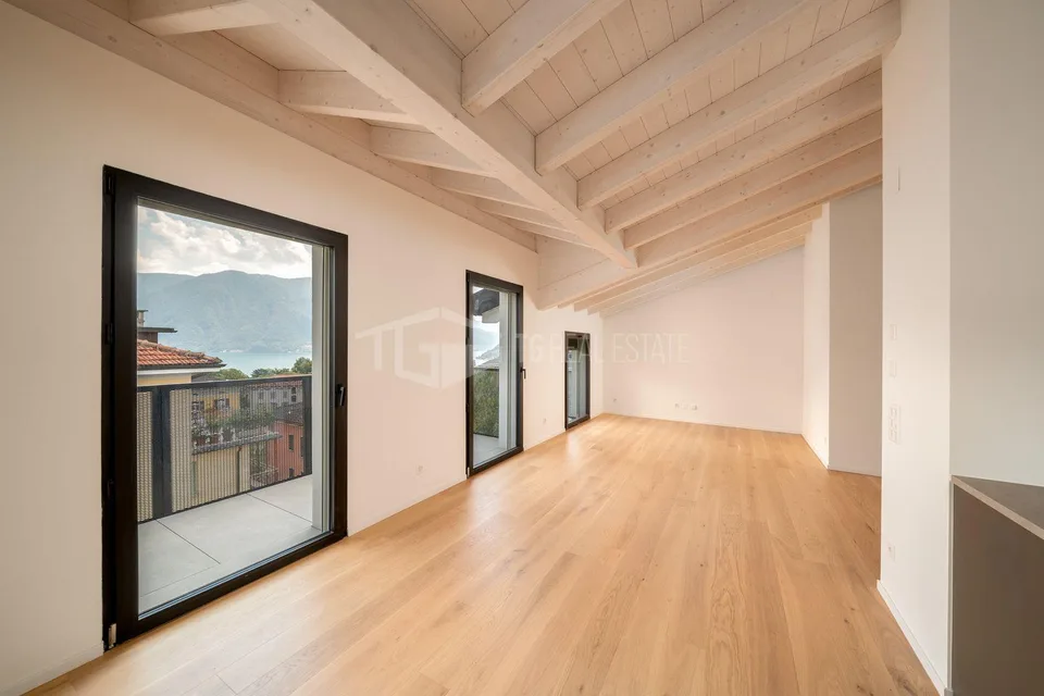 NEUES DACHGESCHOSS-MANSARDEMIT SEEVIEW – Foto 2 von 17