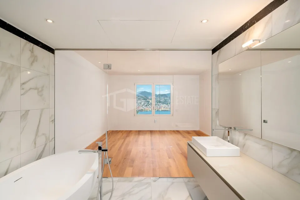 PRESTIGIOUS THREE-BEDROOM APARTMENT WITH STUNNING LAKE VIEWS | PRES... – Foto 10 von 14