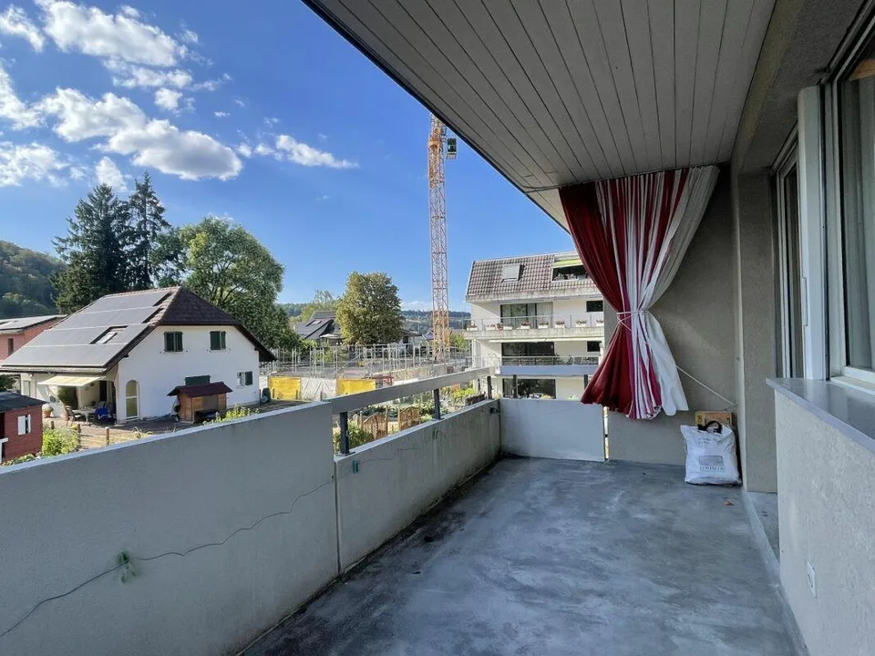 Appartement ensoleillé de 3,5 pièces avec balcon et garage