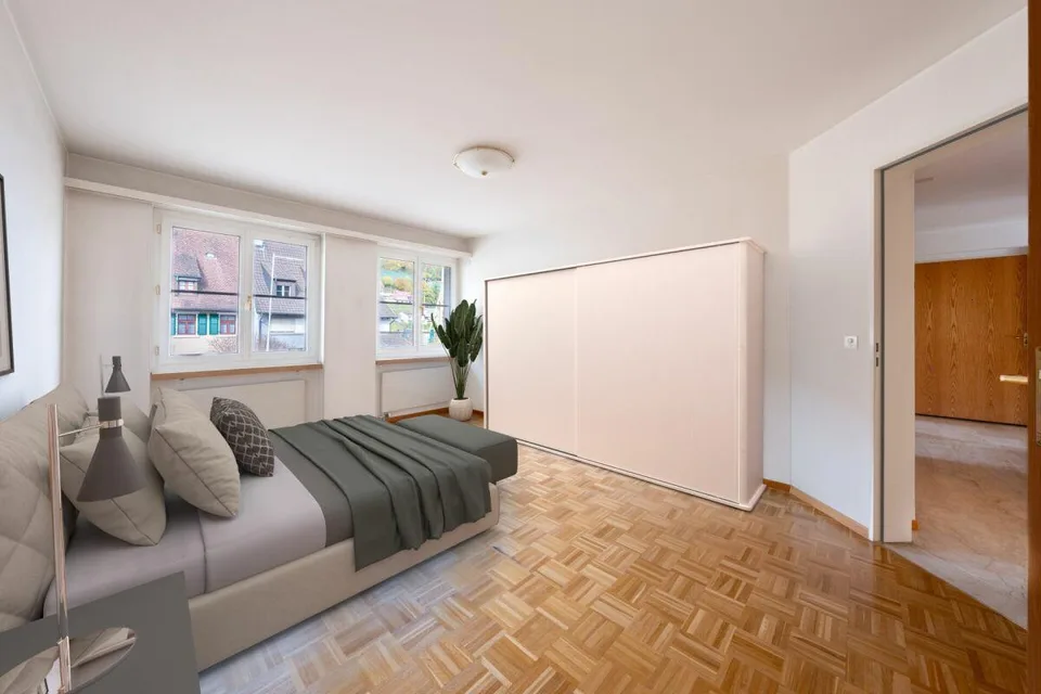 Condominium bien entretenu avec balcon, cave et trois boxes de garage – photo 6 sur 15