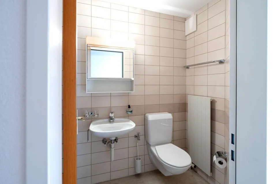 Condominium bien entretenu avec balcon, cave et trois boxes de garage – photo 10 sur 15