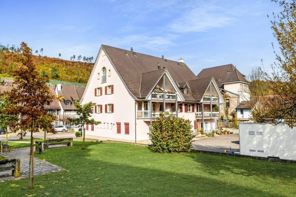 Condominium bien entretenu avec balcon, cave et trois boxes de garage – photo 13 sur 15