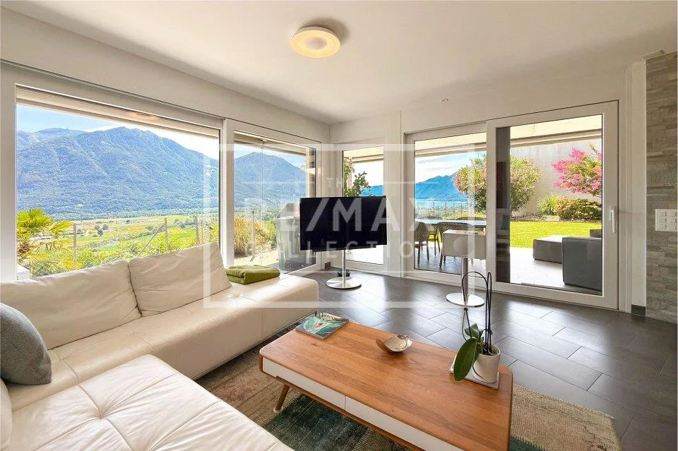 Appartamento 3.5 locali con giardino e vista lago