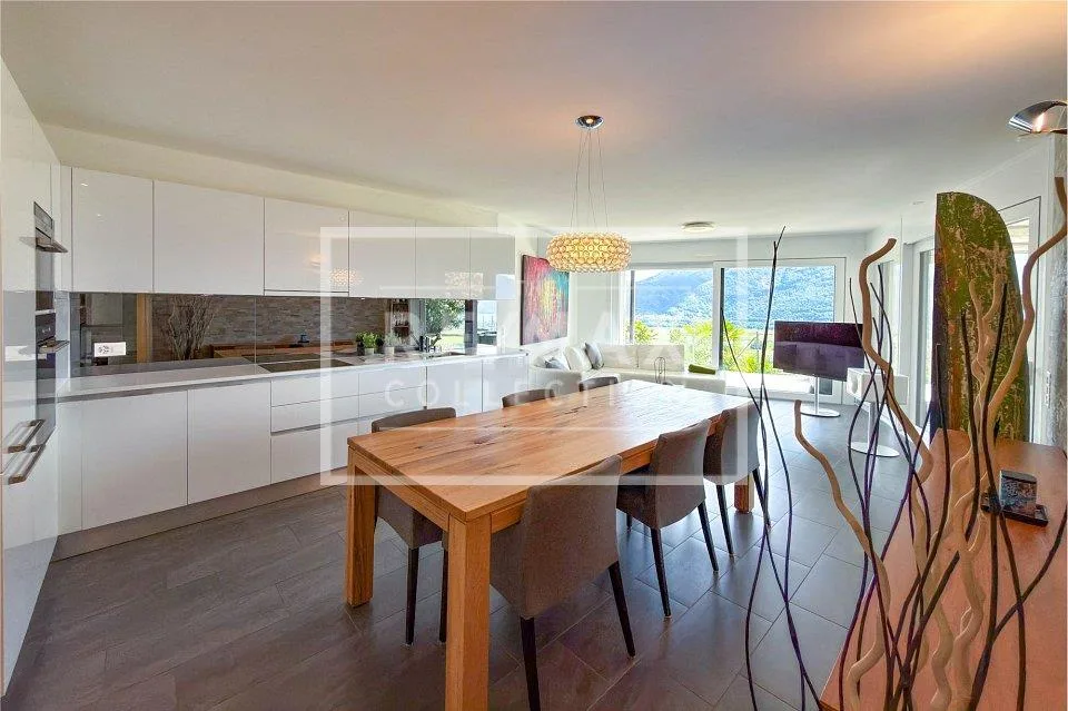 Appartamento 3.5 locali con giardino e vista lago