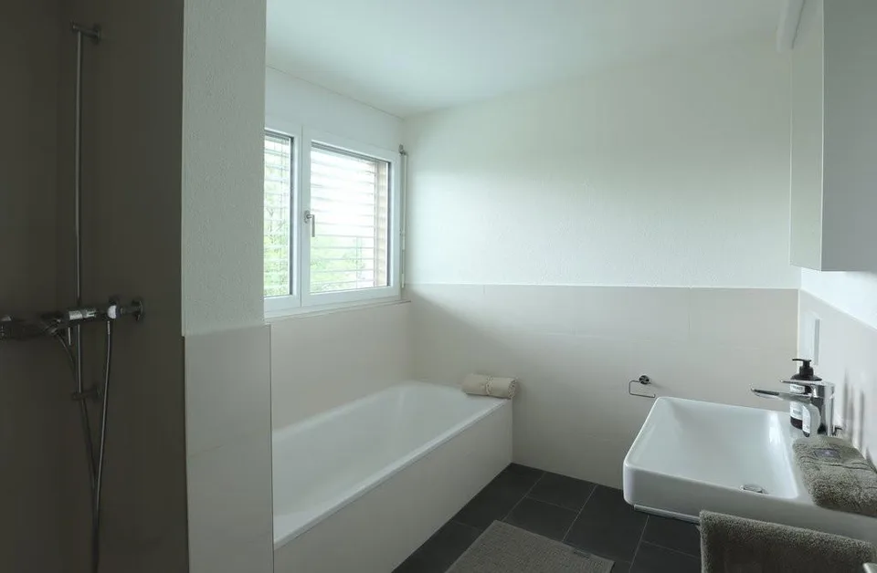 Appartement moderne en attique avec tour de lavage privée – photo 11 sur 12