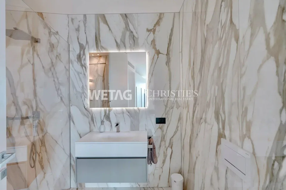 Appartamento penthouse moderno con vista spettacolare sul Lago di Lugano & giardino privato in vendita a Lugano-Vernate – foto 11 di 13