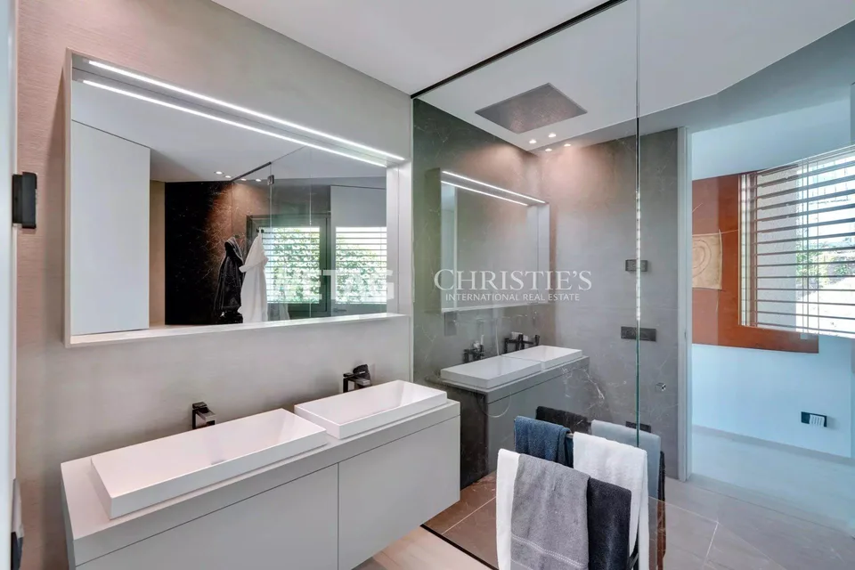 Appartamento penthouse moderno con vista spettacolare sul Lago di Lugano & giardino privato in vendita a Lugano-Vernate – foto 9 di 13