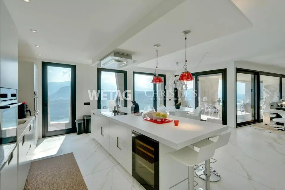 Appartamento penthouse moderno con vista spettacolare sul Lago di Lugano & giardino privato in vendita a Lugano-Vernate – foto 8 di 13