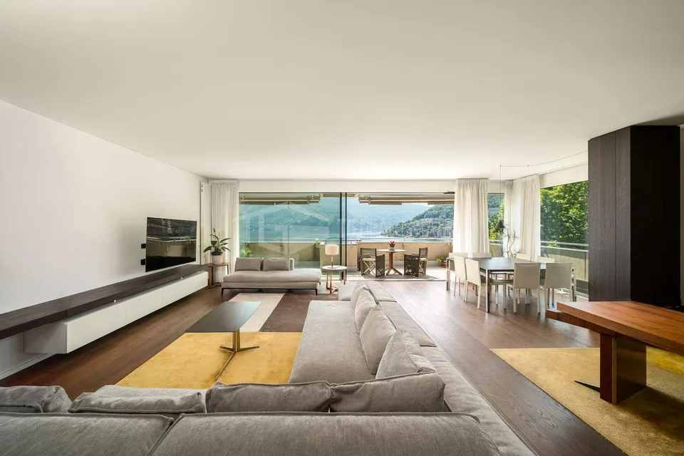 ELEGANTE ATTICO AL 12° PIANO NEL CUORE DI LUGANO | ELEGANT 12TH FLO...