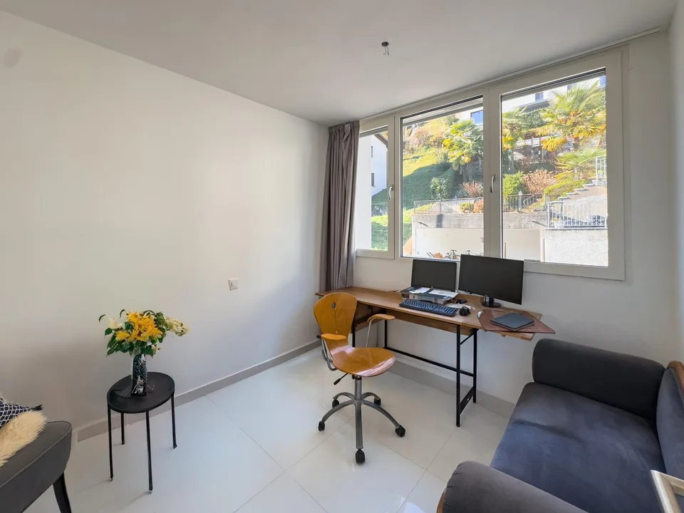 Moderna casa contigua con giardino ad Agno