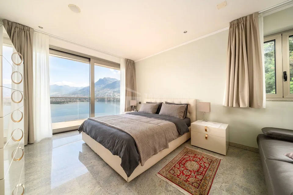 ATTICO DI 5.5 LOCALI CON MERAVIGLIOSA VISTA LAGO | 5.5-ROOM PENTHOU... – photo 15 sur 17