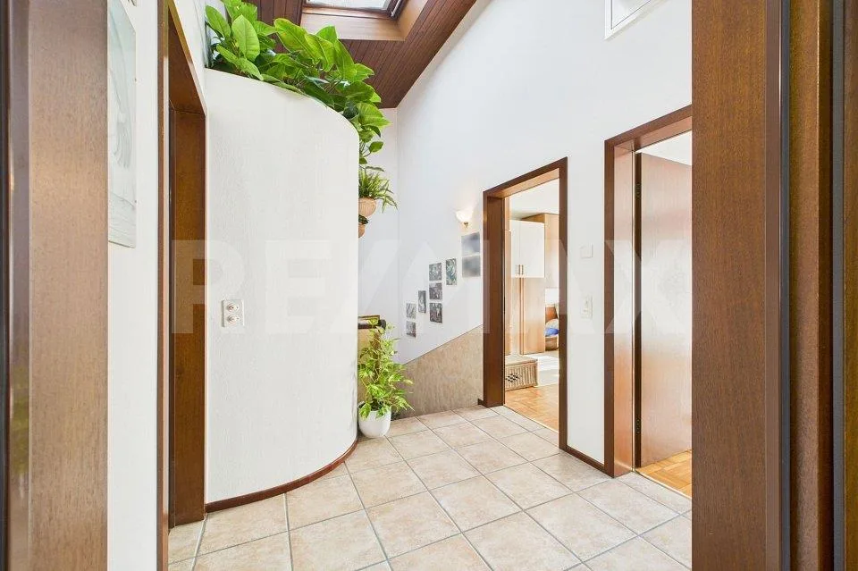Elegante casa gemella con giardino incantevole a Bedano – Foto 8 von 13