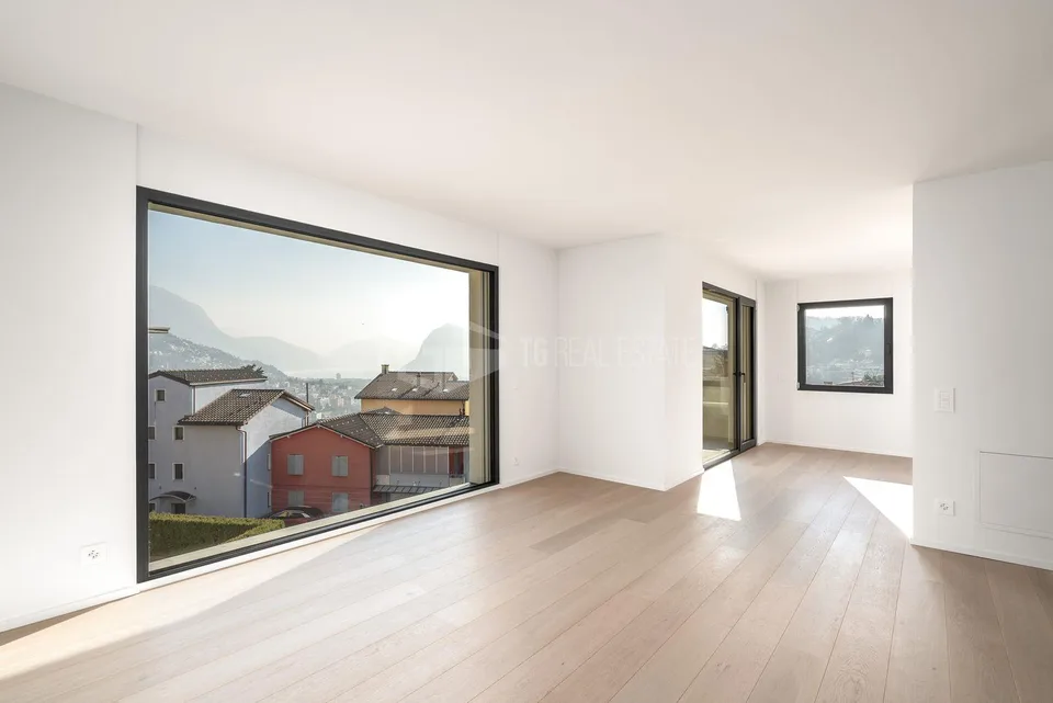 MODERNO ATTICO DI 4.5 LOCALI CON VISTA LAGO | MODERN 4.5-ROOM PENTH...