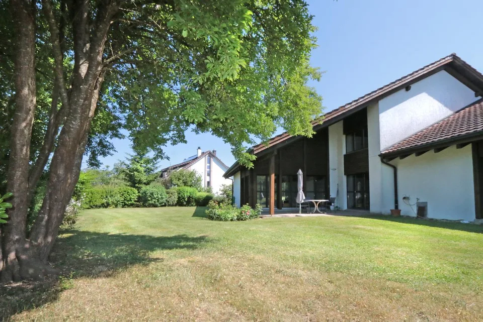 Maison unifamiliale conviviale avec grand jardin