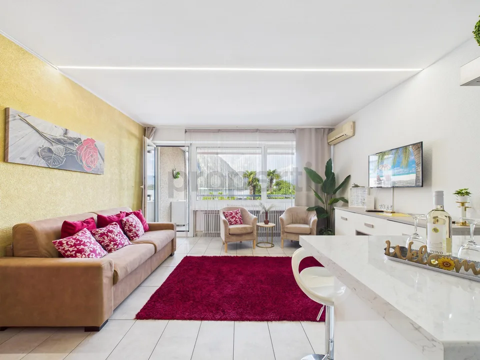 Appartamento 2.5 locali con vista lago e piscina condominiale – ide...