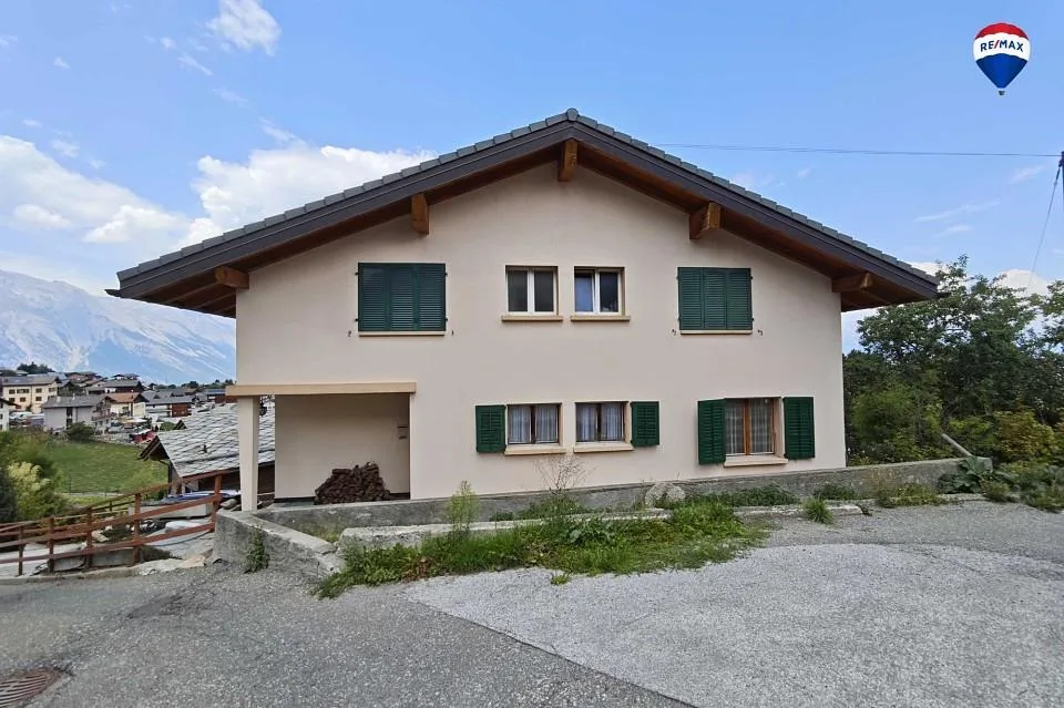 Appartement de 4 pièces inclus garage box.
