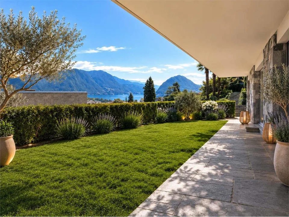 Ampio appartamento con giardino privato e vista lago a Massagno