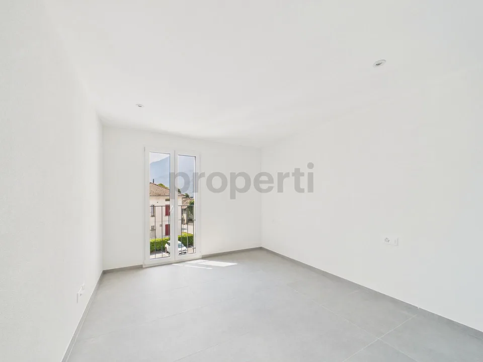 Moderno appartamento 2.5 locali con posto auto e colonnina di ricar...