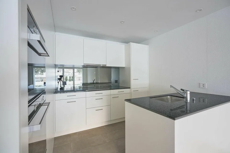 Moderne 3.5-Zimmerwohnung mit Stil und Komfort im Erdgeschoss