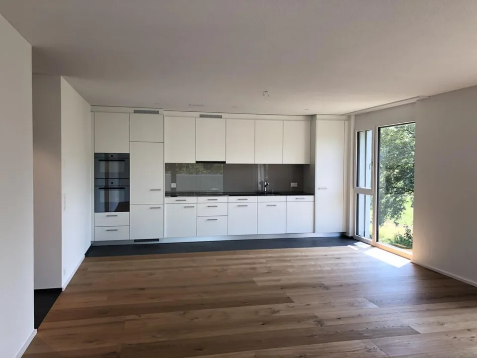 Familienwohnung mit hohem Ausbaustandard und Gartensitzplatz