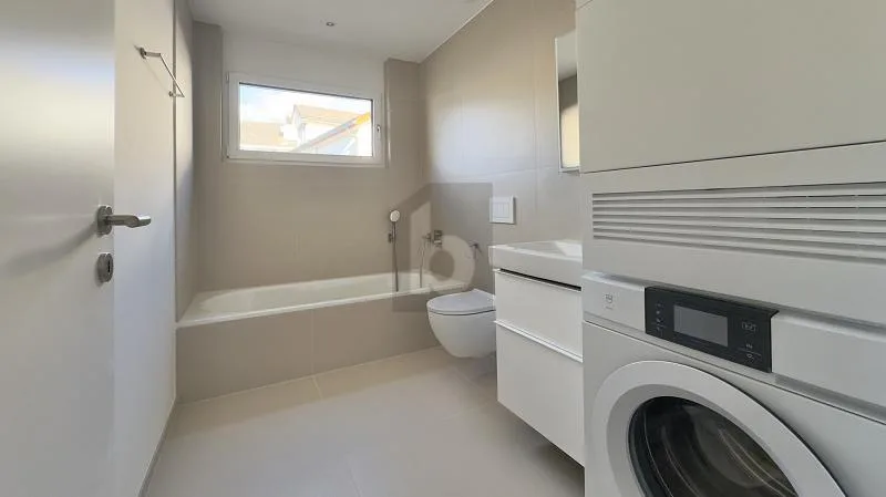 MODERNER NEUBAU AN ZENTRALER LAGE