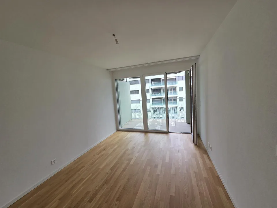 Superbe 4,5 pièces neuf, 2 balcons, parking sous-terrain avec