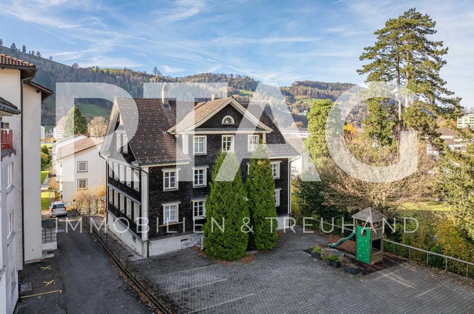 Wohn- und Geschäftshaus | Mehrfamilienhaus