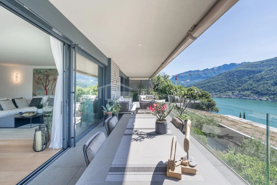 ESCLUSIVO APPARTAMENTO DI 3.5 LOCALI CON VISTA LAGO