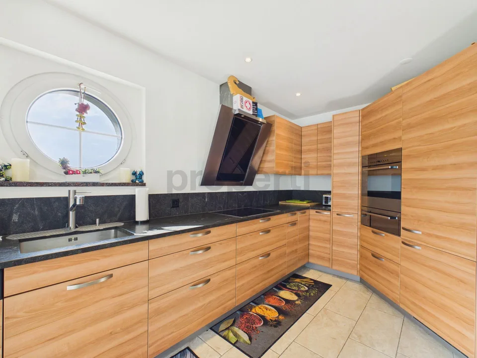 Dreamy 4.5-room apartment with winter garden, terrace, and panoramic view in Fläsch