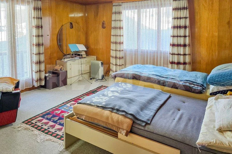 Mehrfamilienhaus mit 3 grossen Wohnungen, zusätzlichen Wohnräumen u... – Foto 8 von 13