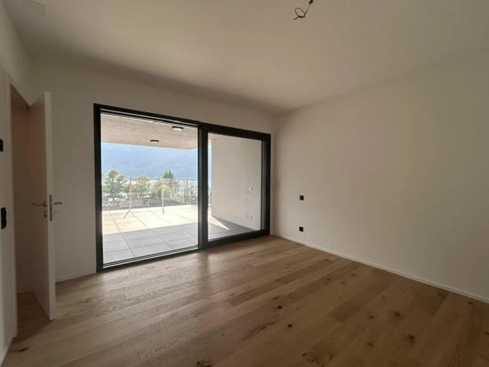 NUOVO ATTICO 3.5 LOCALI CON ROOFTOP DI 38MQ VISTA LAGO – photo 13 of 29