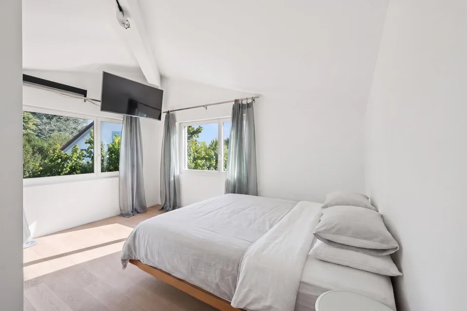Appartamento penthouse esclusivo con studio e offerta di parcheggio rara