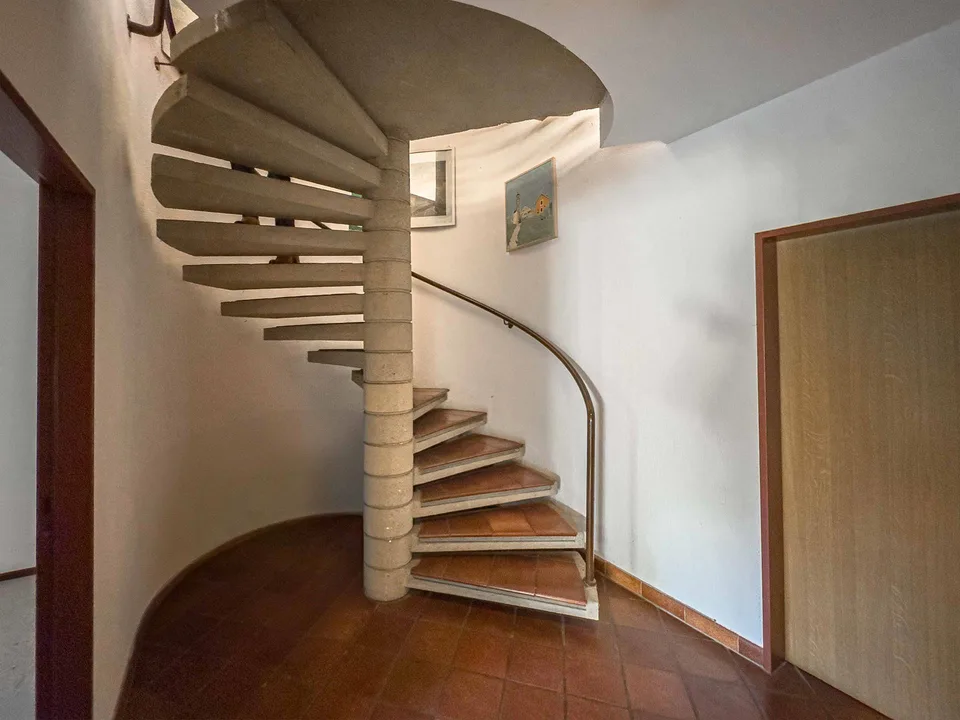 Spaziosa casa gemella con giardino a Melano