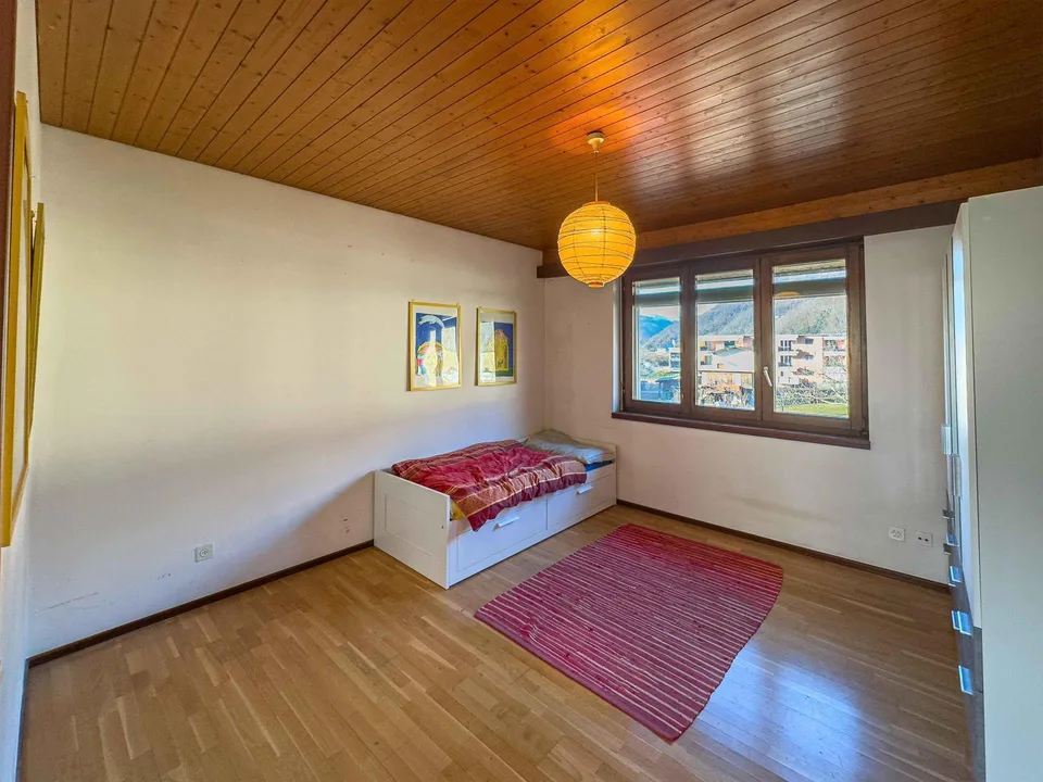 Spaziosa casa gemella con giardino a Melano