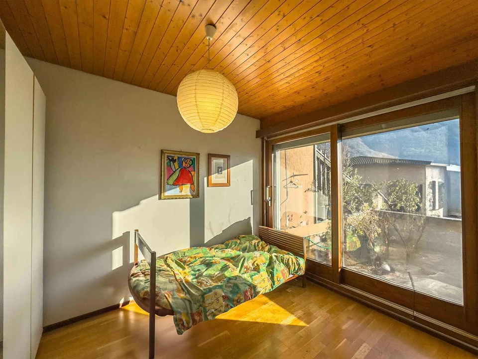 Spaziosa casa gemella con giardino a Melano