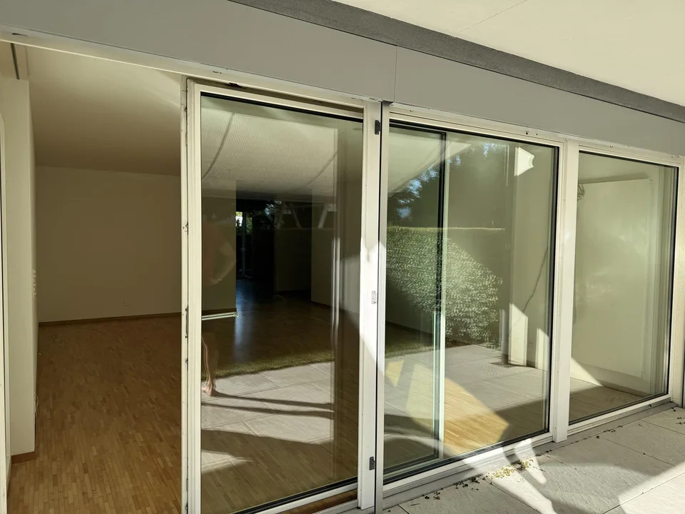 Charmante Wohnung mit Wintergarten, Garten und perfekter Lage