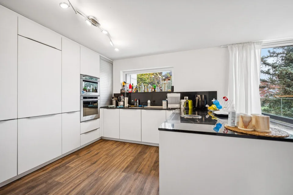 Exklusives Wohnen mit Aussicht: Einfamilienhaus mit Einliegerwohnung