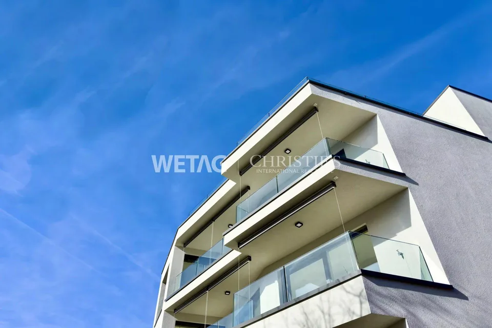 Penthouse élégant en construction brute à Lugano-Canobbio à vendre, avec terrasse panoramique & vue sur le lac de Lugano