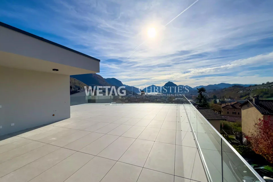 Penthouse élégant en construction brute à Lugano-Canobbio à vendre, avec terrasse panoramique & vue sur le lac de Lugano