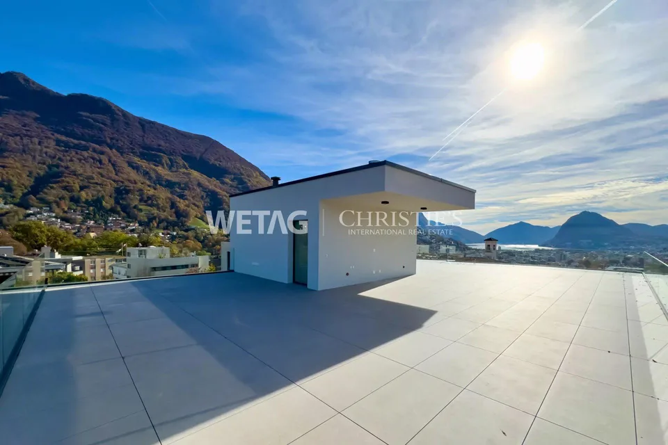 Penthouse élégant en construction brute à Lugano-Canobbio à vendre, avec terrasse panoramique & vue sur le lac de Lugano