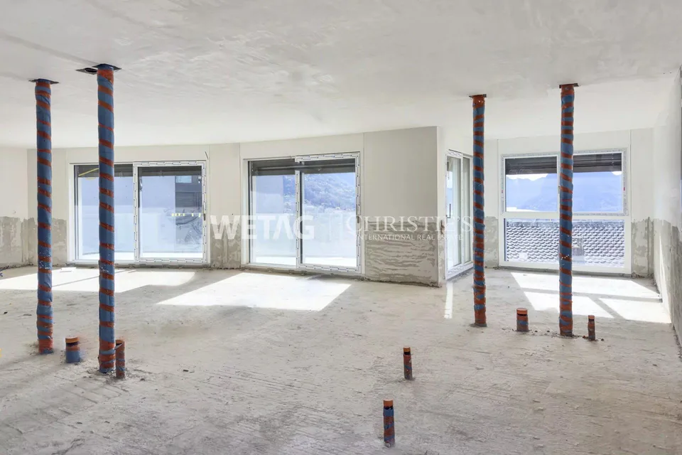 Penthouse élégant en construction brute à Lugano-Canobbio à vendre, avec terrasse panoramique & vue sur le lac de Lugano