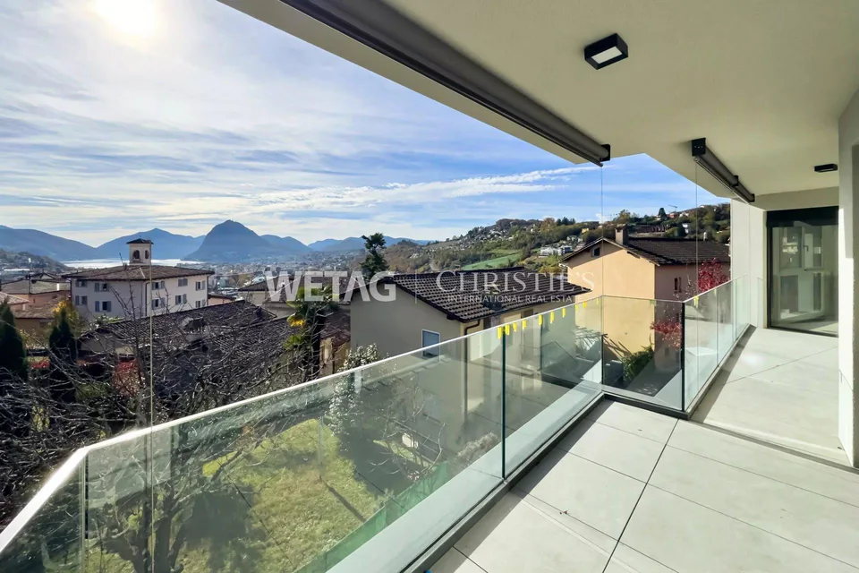 Penthouse élégant en construction brute à Lugano-Canobbio à vendre, avec terrasse panoramique & vue sur le lac de Lugano