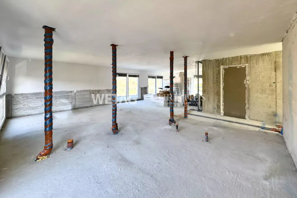 Penthouse élégant en construction brute à Lugano-Canobbio à vendre, avec terrasse panoramique & vue sur le lac de Lugano