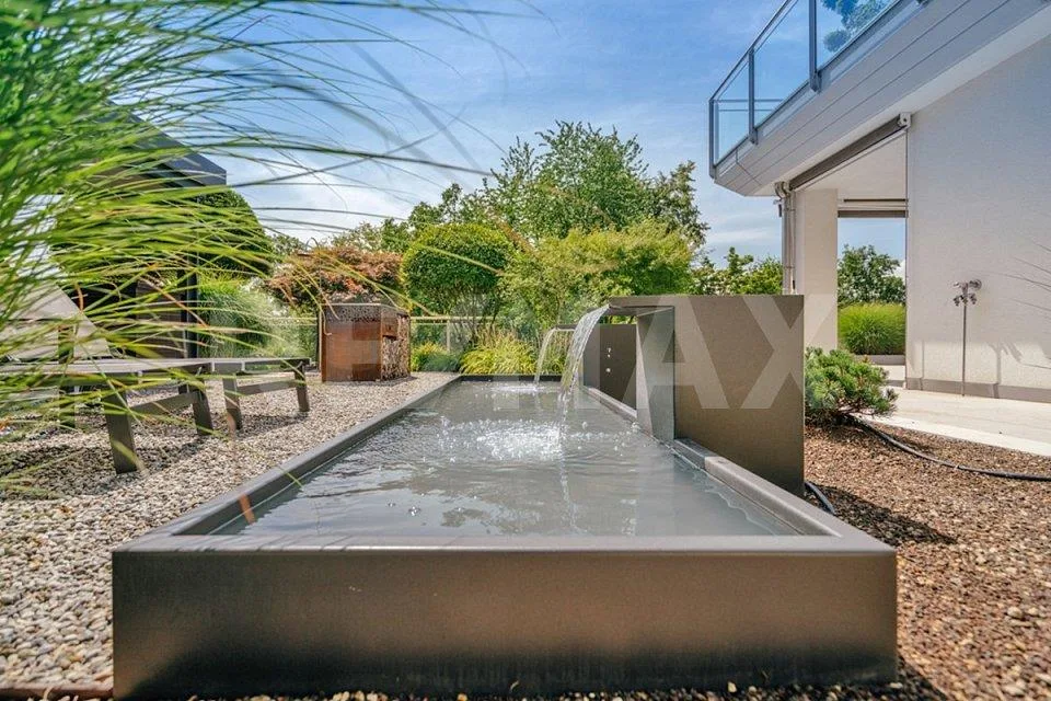 Terrassen-HAUS inkl. Doppelgarage und AAA-Gartenanlage