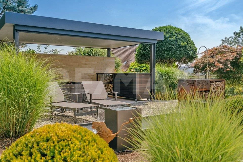 Terrassen-HAUS inkl. Doppelgarage und AAA-Gartenanlage