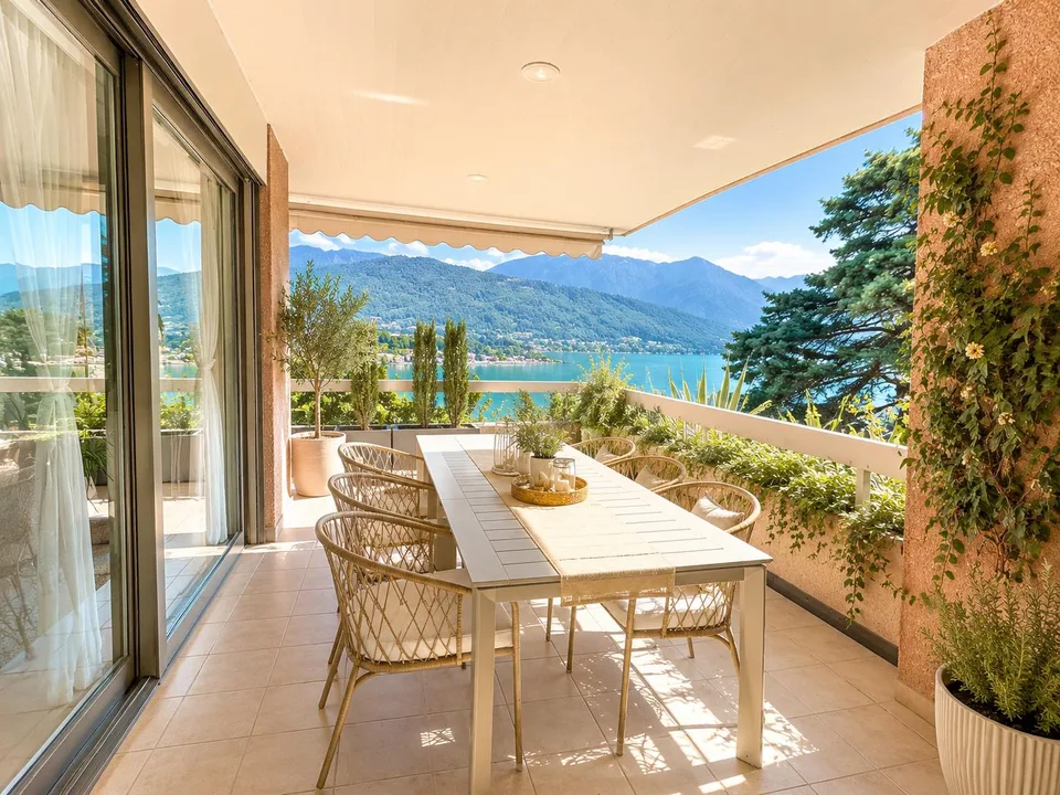Attico da sogno sul Lago di Lugano con terrazzo e vista spettacolare