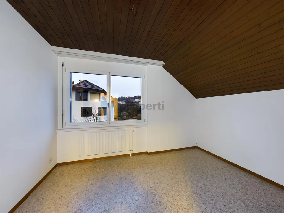 Appartement mansardé rénové dans un emplacement central et calme